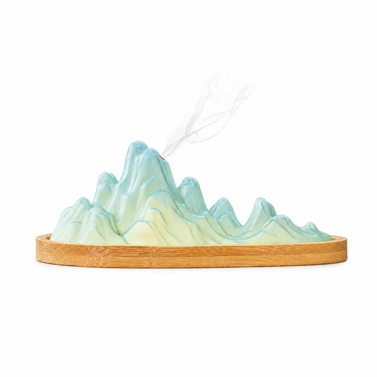 Handcrafted Emerald Mountain ceramic incense holder with sculpted mountain peaks and natural bamboo base for incense sticks, meditation, tea ceremonies, and Zen home décor.